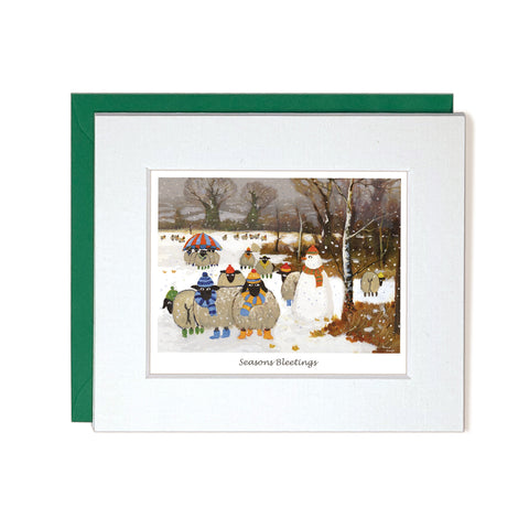 Greetings Card sheep outside during winter in forest