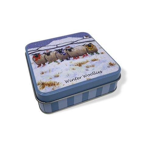 Impressive mini storage tin depicting sheep in a snowy field.