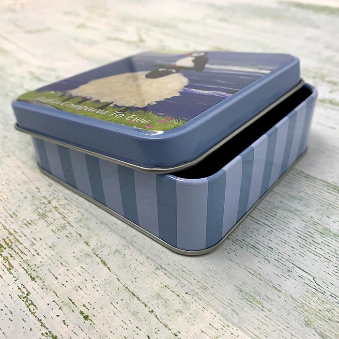 Puffin Compares to Ewe Fudge Tin