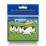 Refrigerator magnet sheep standing with their lambs in a lush green field