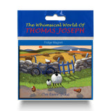 Refrigerator magnet showing sheep standing on edge of country road with its little lamb