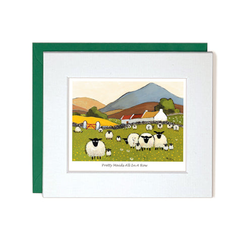 Card with mount sheep and lambs in a field