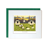 Card with mount spring lambs playing with aprents