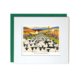 Card with mount sheep on road with cows watching them