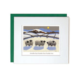 Card with mount sheep in the field during winter