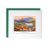 Card with mount two goats watching a sunset