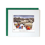 Card with mount lambs wearing Christmas outfits