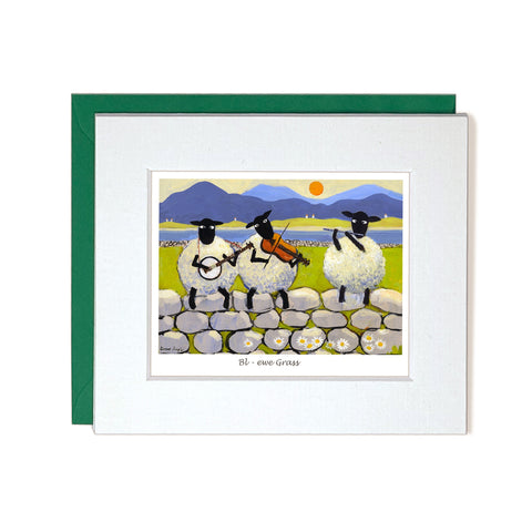 Notecard sheep sitting on wall playing the flute