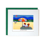 Card with mount sheep relaxing on beach