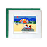 Card with mount sheep relaxing on beach