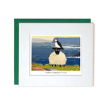 Card with mount sheep and puffin on cliff