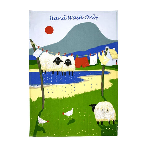 sheep on a washing line in front of beach tea towel
