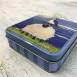 Puffin Compares to Ewe Fudge Tin